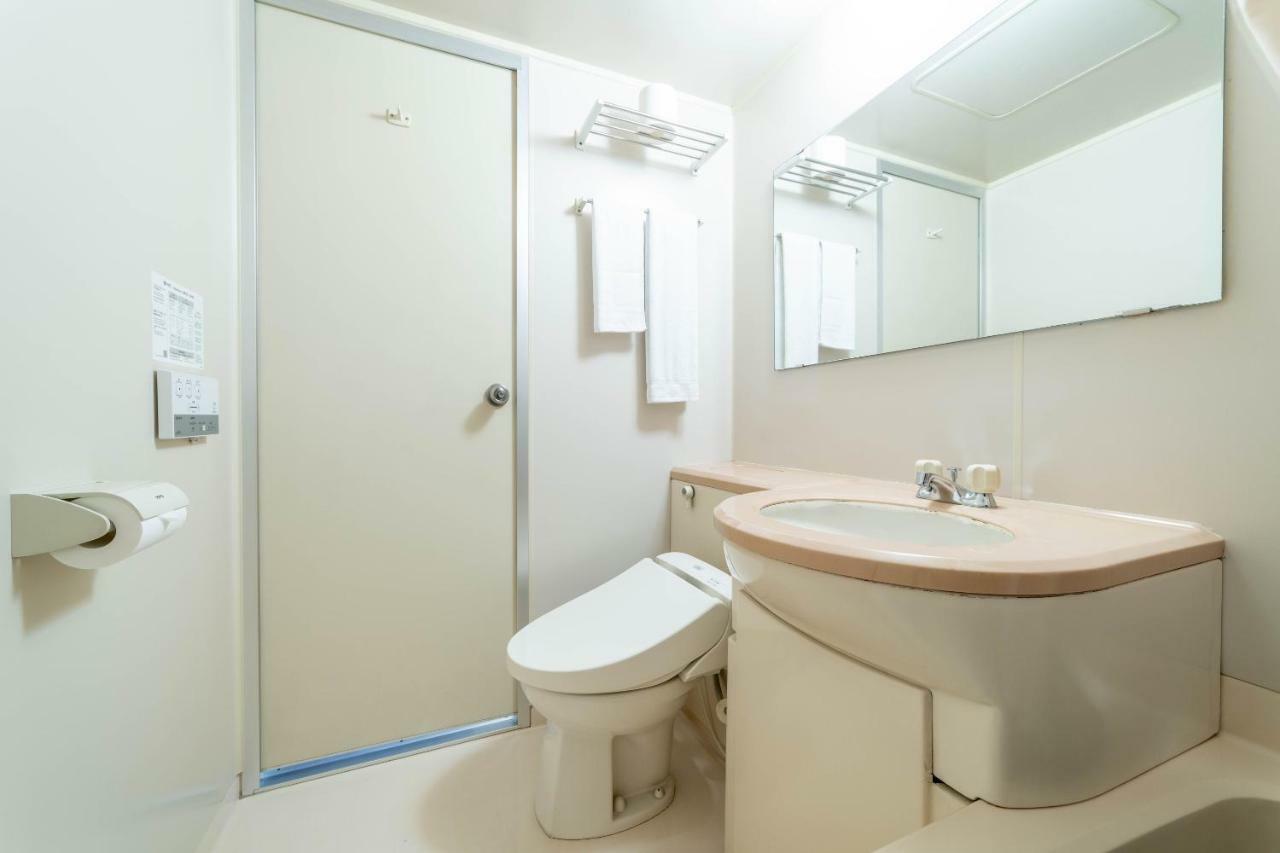 Oyo Business Hotel Nishiura Йокаичи Екстериор снимка