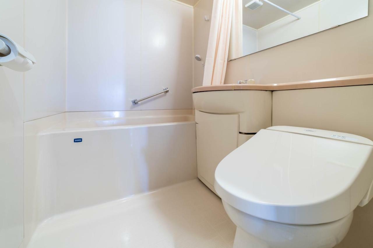 Oyo Business Hotel Nishiura Йокаичи Екстериор снимка